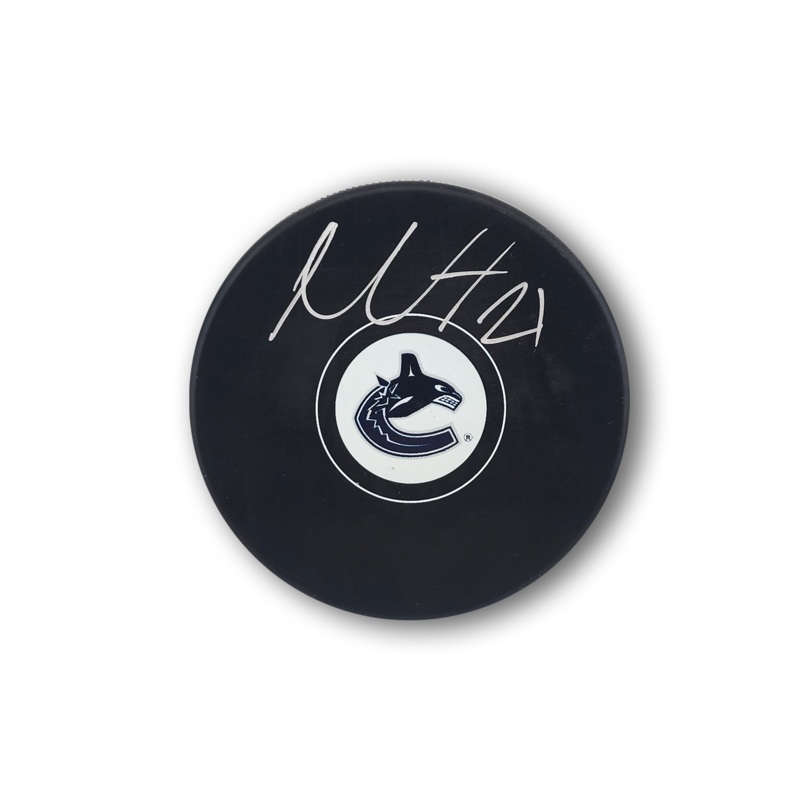 Nils Hoglander Autographed Vancouver Canucks Hockey Puck